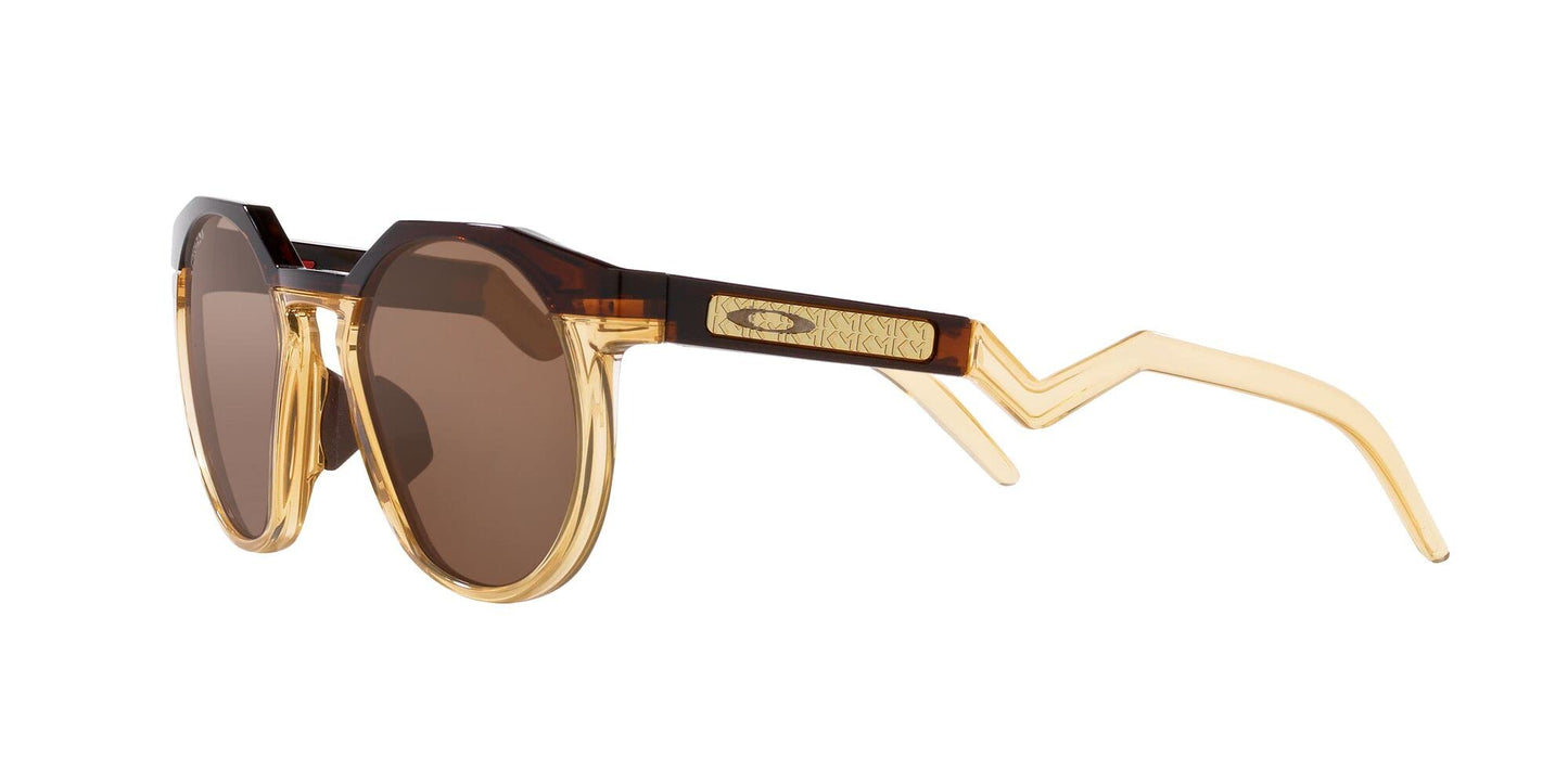 Oakley Men's OO9242A HSTN Low Bridge Fit Round Sunglasses, Kylian Mbappe Dark Amber/Light Curry/Prizm Tungsten, 52 mm