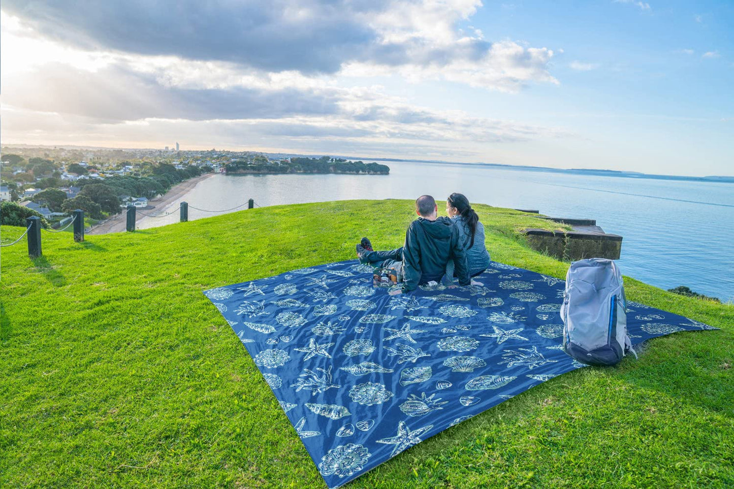 WEKAPO Beach Blanket Waterproof Sandproof Oversized, Extra Large Beach Mat Sand Free, Lightweight & Compact Sand Free Mat with 6 Stakes & 4 Corner Pockets (Blue Sea Shells, 8 x 7 FT (1~4 Person))