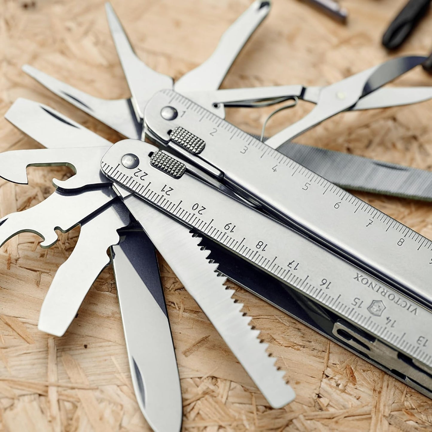 Victorinox Swiss Tool Swiss Army Knife, 24 Function Swiss Made Multi-Tool with Needle-Nose Pliers, Wire Cutters and Large Blade - Silver