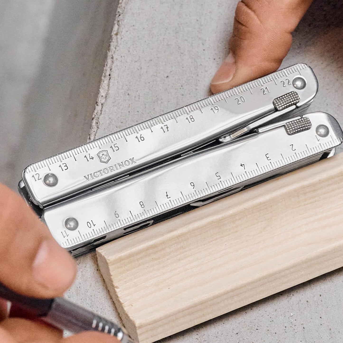 Victorinox Swiss Tool Swiss Army Knife, 24 Function Swiss Made Multi-Tool with Needle-Nose Pliers, Wire Cutters and Large Blade - Silver