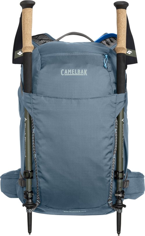 CamelBak Women's Rim Runner X28 Hiking Hydration Backpack with 2L Reservoir Bladder, Crystal Blue