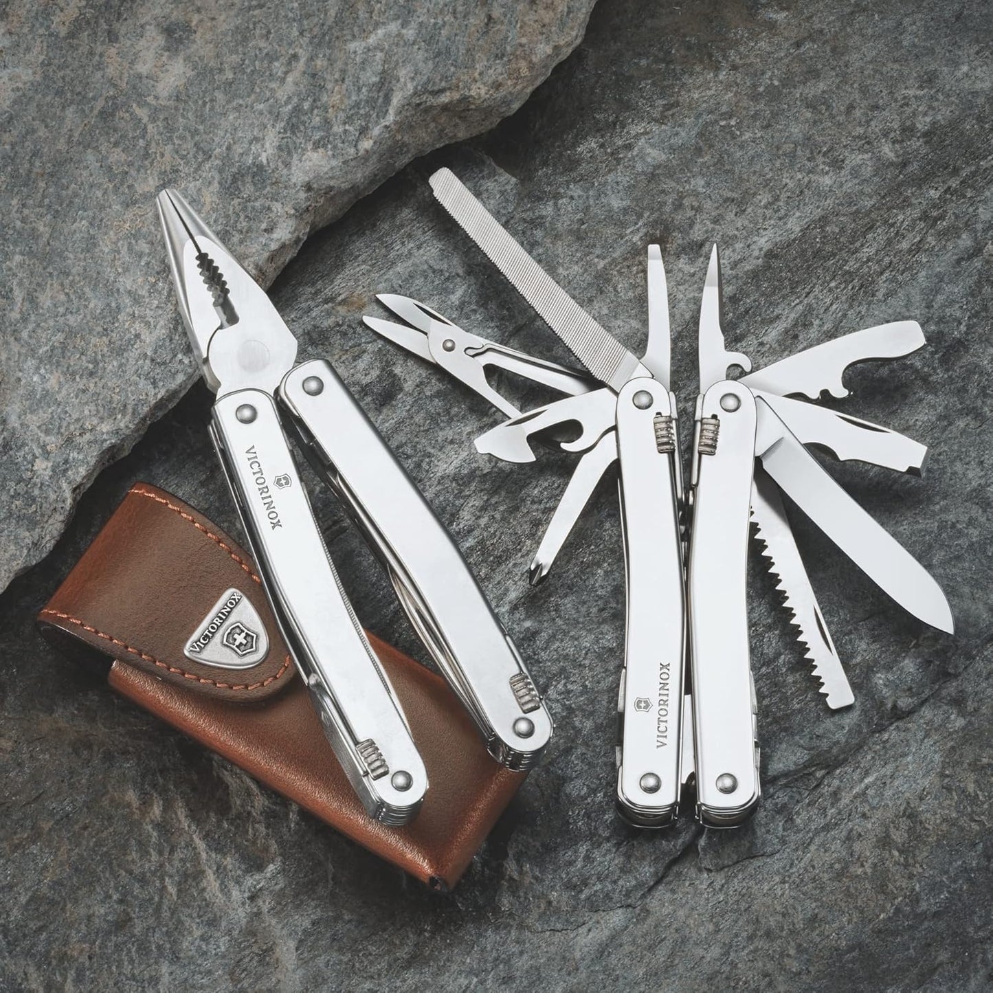 Victorinox Swiss Tool Swiss Army Knife, 24 Function Swiss Made Multi-Tool with Needle-Nose Pliers, Wire Cutters and Large Blade - Silver