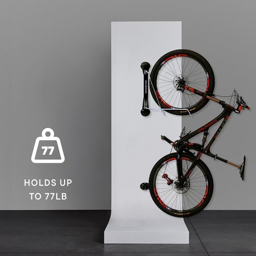 Steadyrack Bike Rack for Mountain Bikes - Original Wall Mounted Vertical Bike Storage - Fits Wide Tires - Space Saving Pivot Design - Heavy-Duty Steel Rack for Indoor Garage, Apartment or Home Use