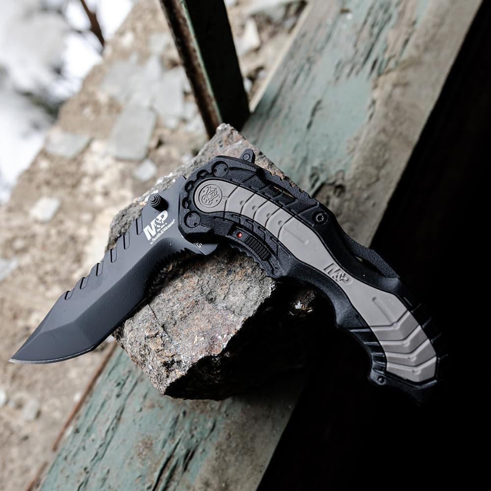 Smith & Wesson SWMP6 7.7in High Carbon S.S. Assisted Folding Knife with 3.4in Clip Point Blade and Aluminum Handle for Outdoor, Tactical, Survival and EDC,Black