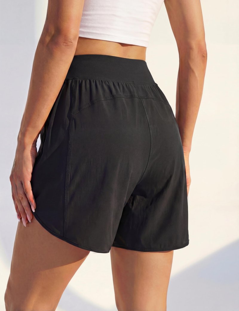 BMJL Women's 5" High Waisted Running Shorts with 2 Zipper Pockets, Dolphin Hem Tummy Control Athletic Workout Shorts for Gym, Travel, Casual(Medium,Black)