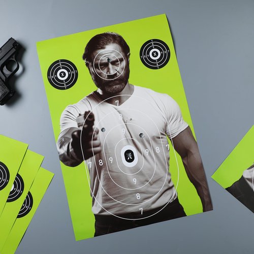 Weekgrat 25 Pcs 12 x 18 Inch Bad Man Paper Shooting Targets Paper Silhouette Targets for Range Fluorescent Yellow Human Designed Target for Shooting Enthusiasts Indoors Outdoors