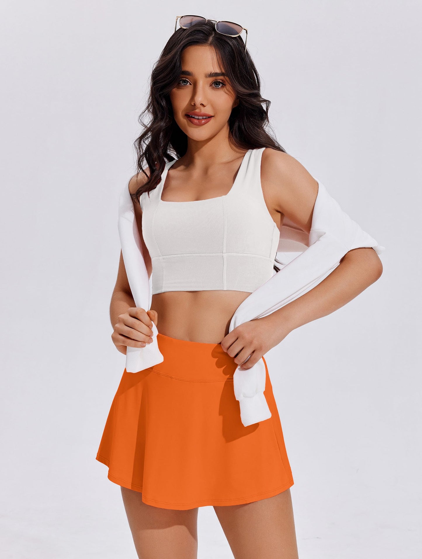 PINSPARK Skorts for Woman High Waisted Tennis Skirt Lightweight Golf Skort Mini Athletic Skirts with Shorts Flowy Skorts for Women with Pockets, Orange Medium