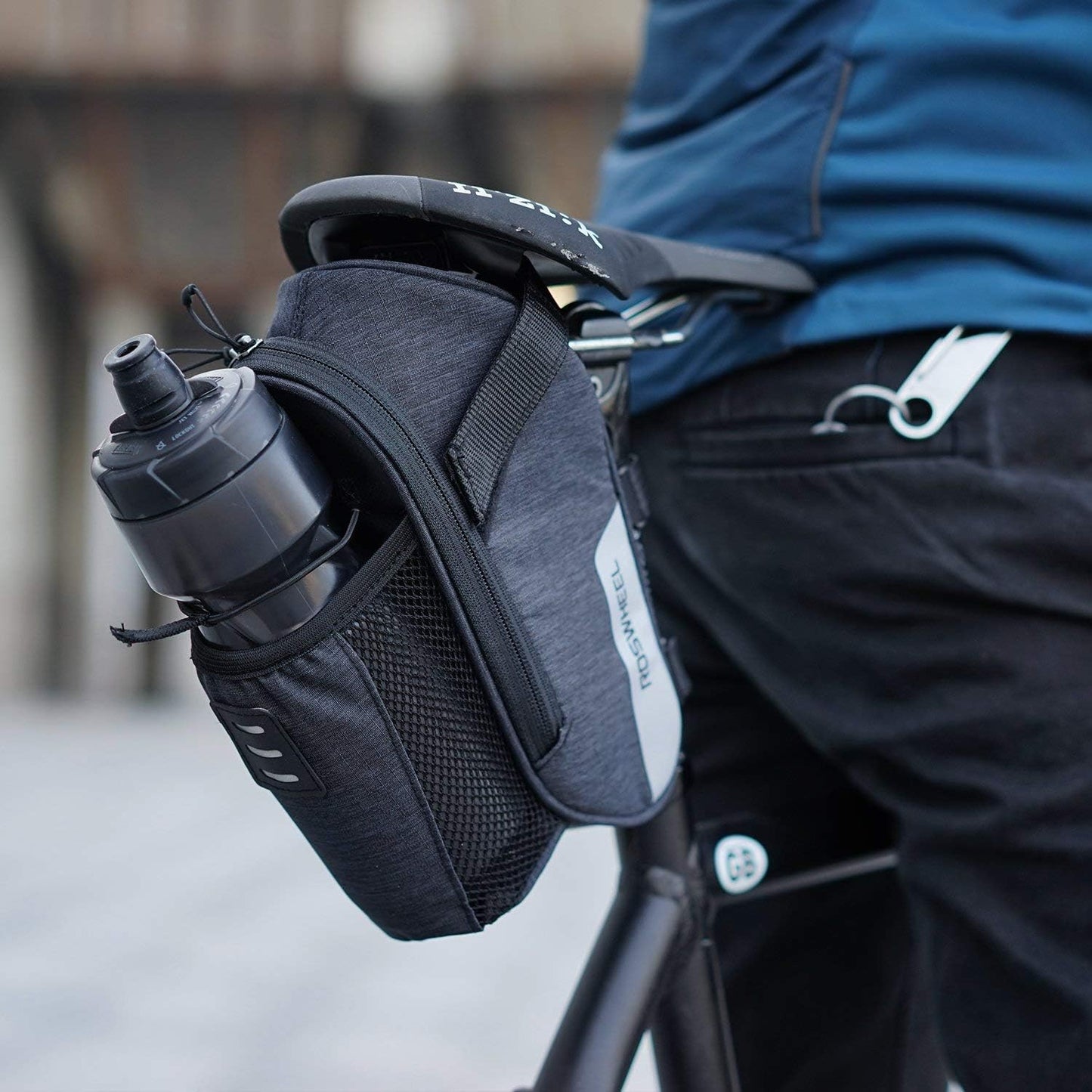 Roswheel Essentials Series 131464 Water Resistant Bike Saddle Bag Bicycle Under Seat Pack Cycling Accessories Pouch with Water Bottle Holder