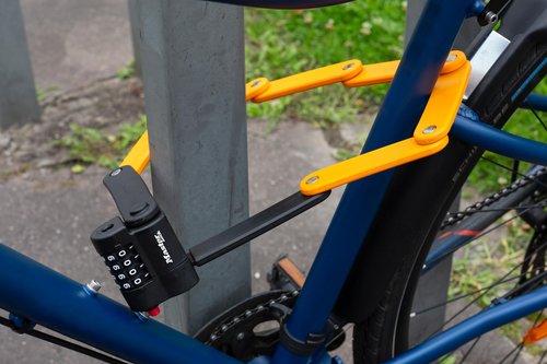 Master Lock Orange Hardened Steel Link Folding Bike Lock, Heavy Duty Anti-Theft Bicycle Lock with Customizable Combination, 2-1/2ft (80cm) Length x 0.15 in (4 mm), 8336EC