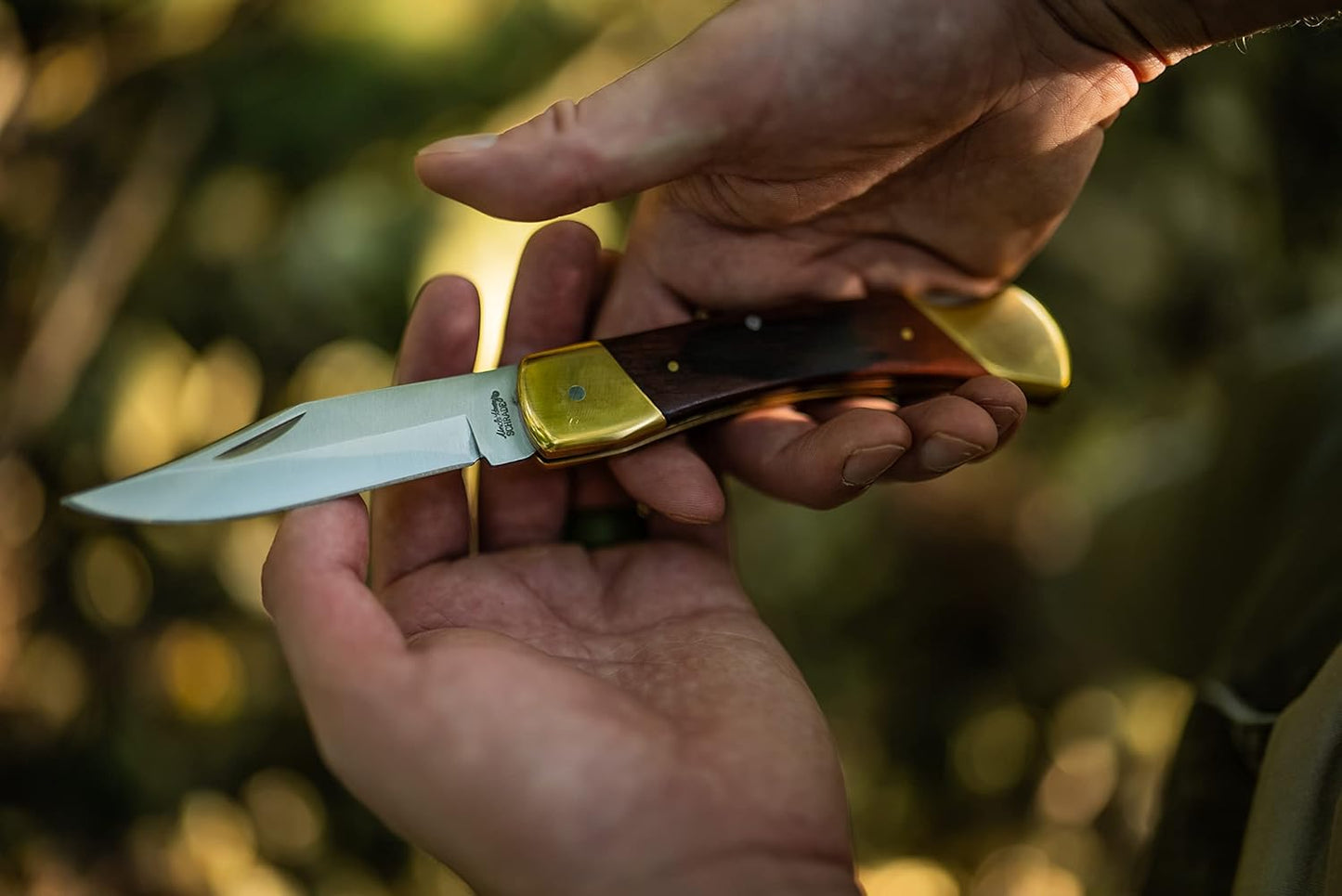Uncle Henry LB7 Bear Paw Traditional Lockback Pocket Knife with 3.7in Clip Point High Carbon S.S. Blade, Wood Handle, Brass Bolsters, and Leather Belt Sheath for EDC, Hunting, Camping, and Outdoors