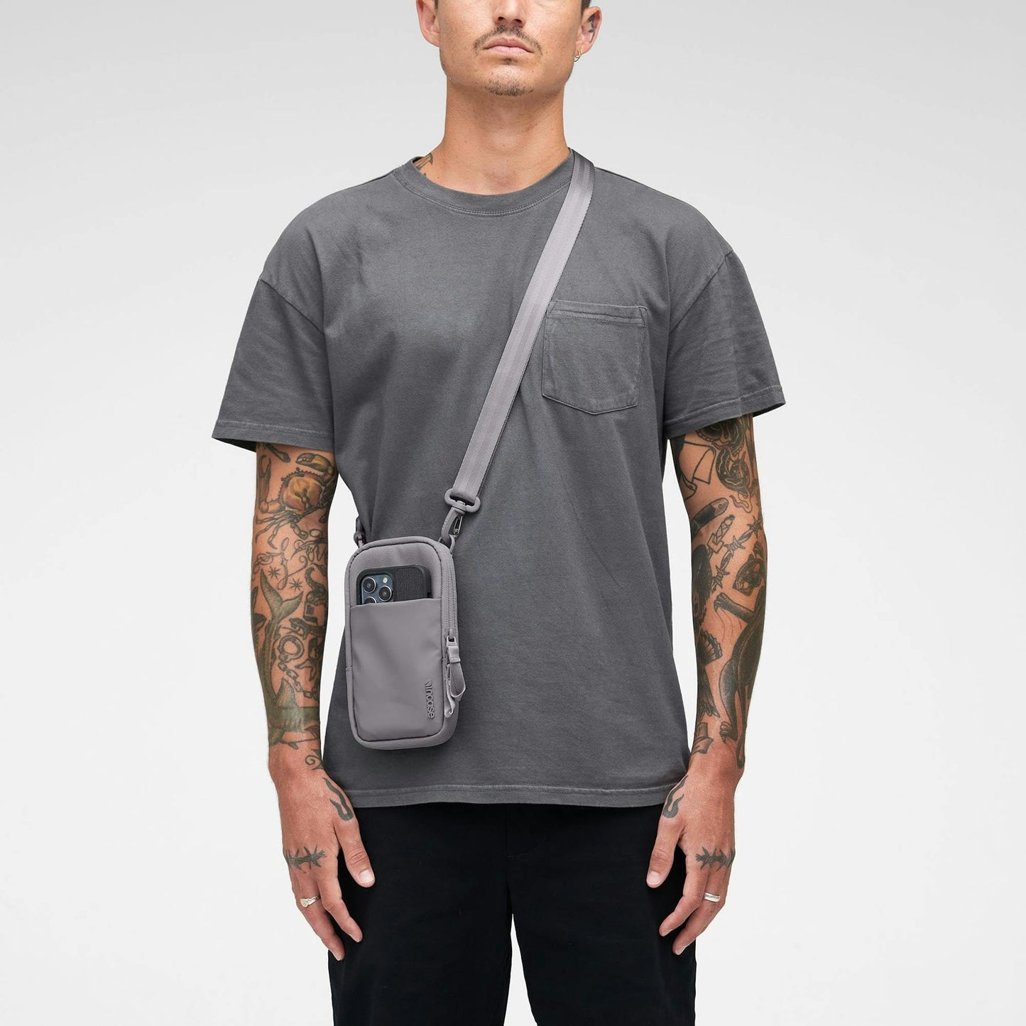 Incase A.R.C. Small Crossbody Bag, Recycled Polyester, Fits iPhone Pro Max, External Pocket, Adjustable Strap, Travel Sling (Grey)