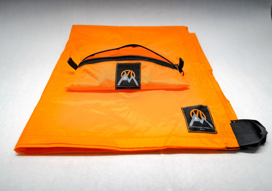 VIAM Outdoors | Multi Cloth Waterproof Ultralight Lightweight Backpacking Camping and Survival Tarp | 1.9oz Orange | Measures 54 inches by 72 inches | has Stake Loops and Guy line Loops