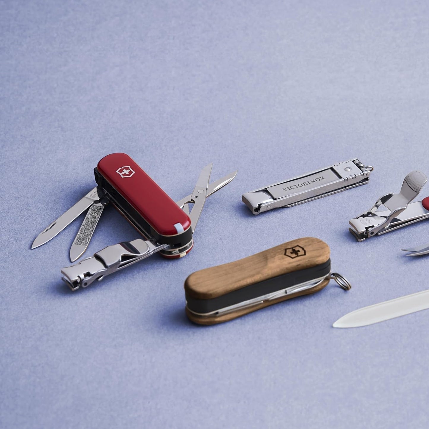 Victorinox Nail Clip 580 Multi-Tool - 8 Functions, Swiss Made with Nail File & Cleaner - Ruby