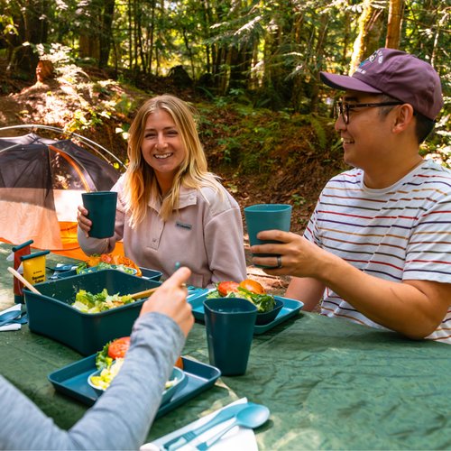 Coghlan's 4-Person Tableware Set for Camping and Outdoor Dining - Durable, Lightweight, Dishwasher Safe, Reusable, Includes Plates, Cups, Bowls, Cutlery in Portable Storage Container with Carry Handle